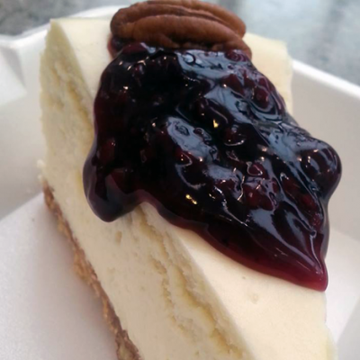 White chocolate Cheesecake with berry and pecan